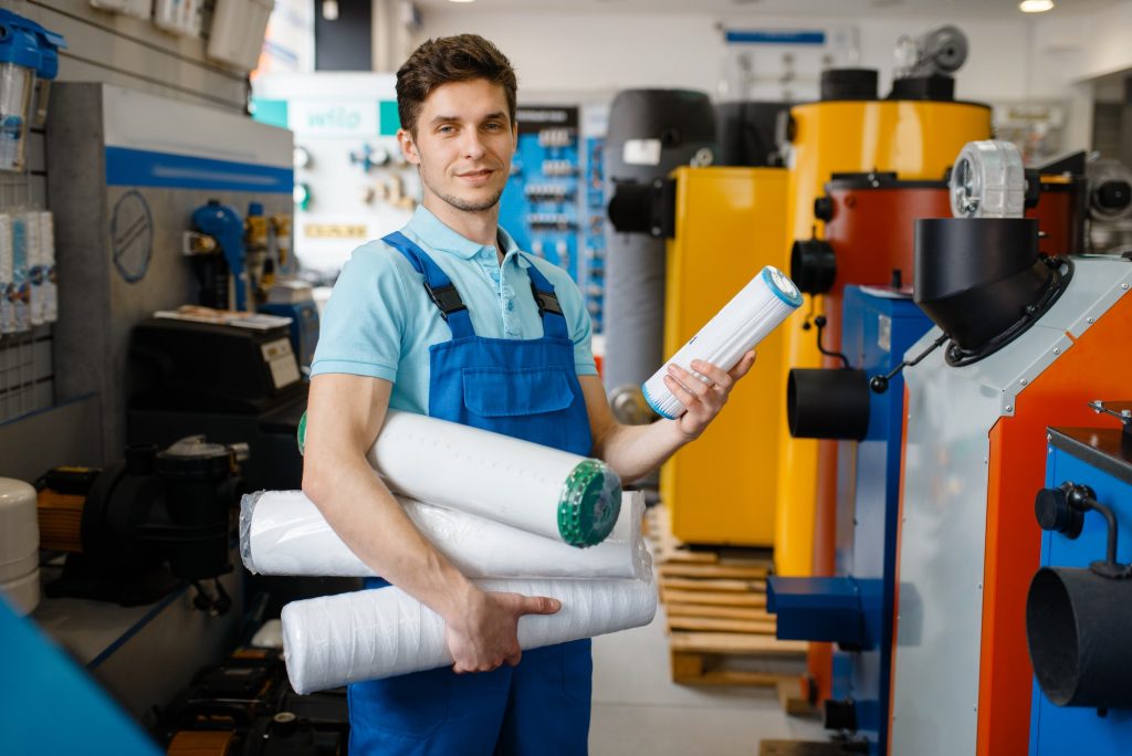 plumber posing at the showcase plumbering store